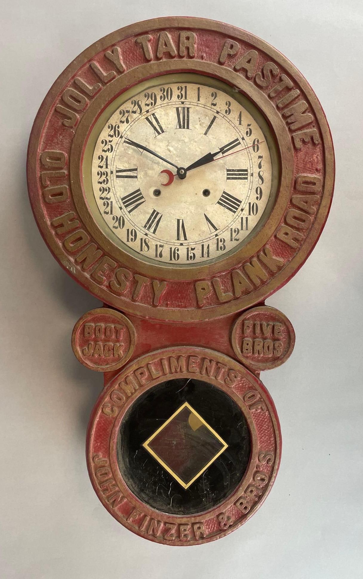 Antique John Finzer and Bros. Jolly Tar Tobacco Advertising Clock: Old honesty plank road, boot pack, includes 2 keys, did not work in test, heyden and trapani clock measures 31 1/2" x 19" x 5"