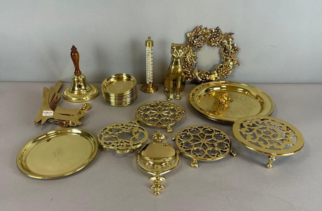 Group of Baldwin Brass Dishes and More: Includes plate easels, bell, cat figurine, largest plate measures 10 1/4"