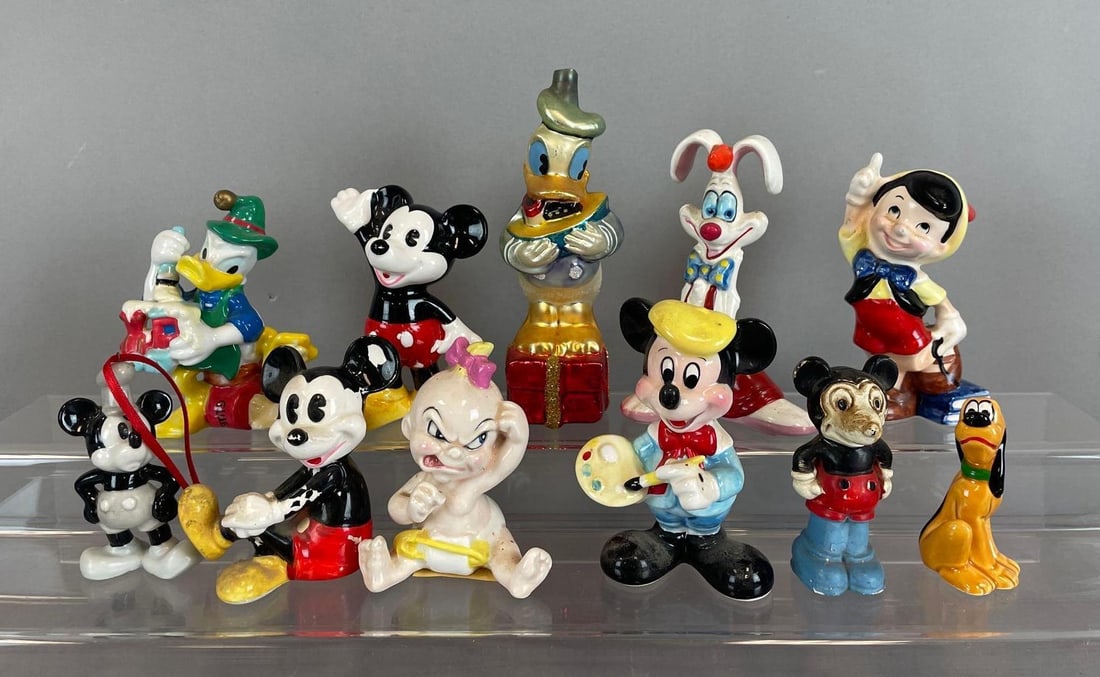 Group of Disney Character Porcelain Figurines: Includes glass Donald Duck Christmas ornament, Mickey Mouse, Pinocchio, tallest measures 6"