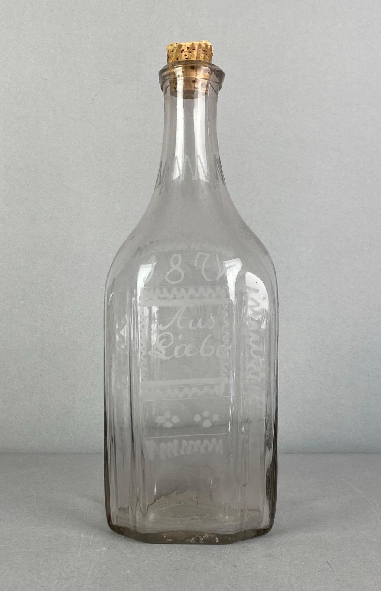 1874 German Aus Liebe Etched Glass Bottle: Out of love etched on face, measures 13? H x 4 1/2? W x 4? D