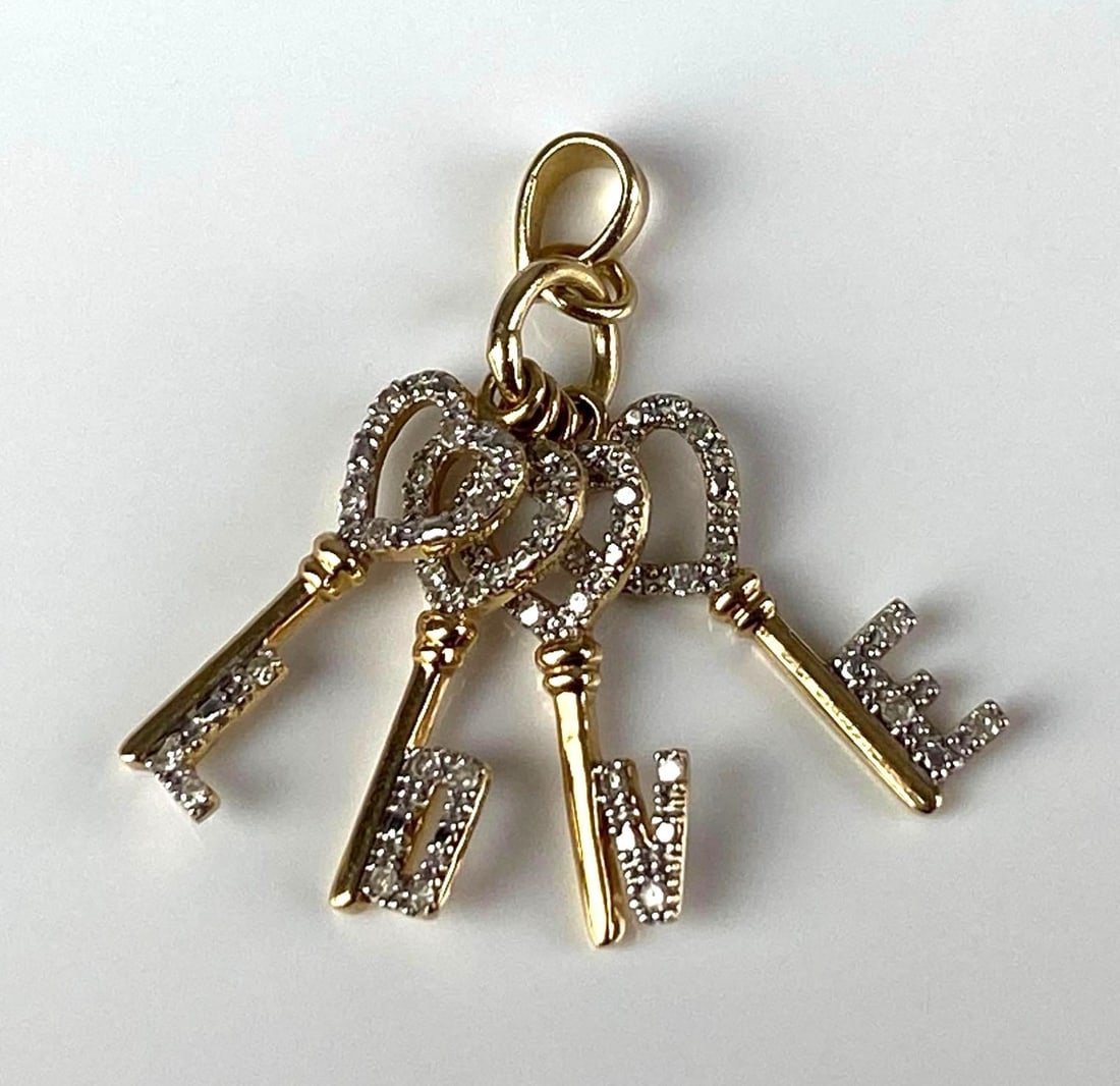 Mexican 14K Yellow Gold Diamond Love Key Pendant: Total weight of 1.9 grams, measures 1? H