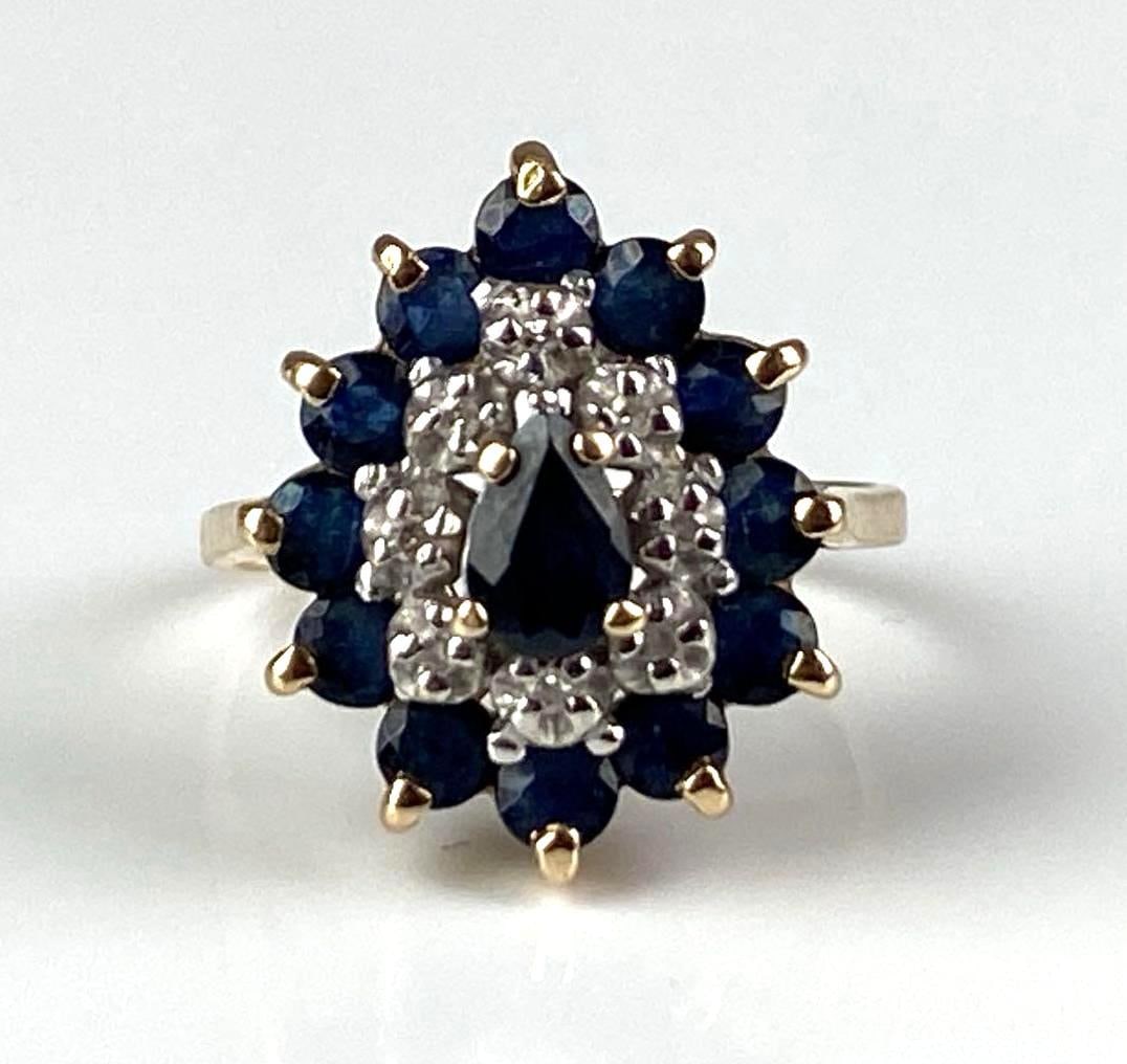 Signed 10K Yellow Gold Diamond Sapphire Cluster Ring: total weight of 3.4 grams, size 6 1/4