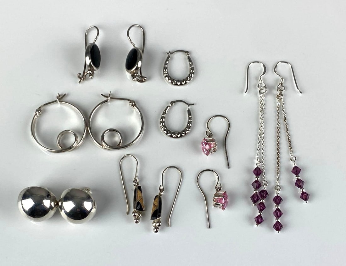 Group of Sterling Silver Earrings: Largest measures 3? H