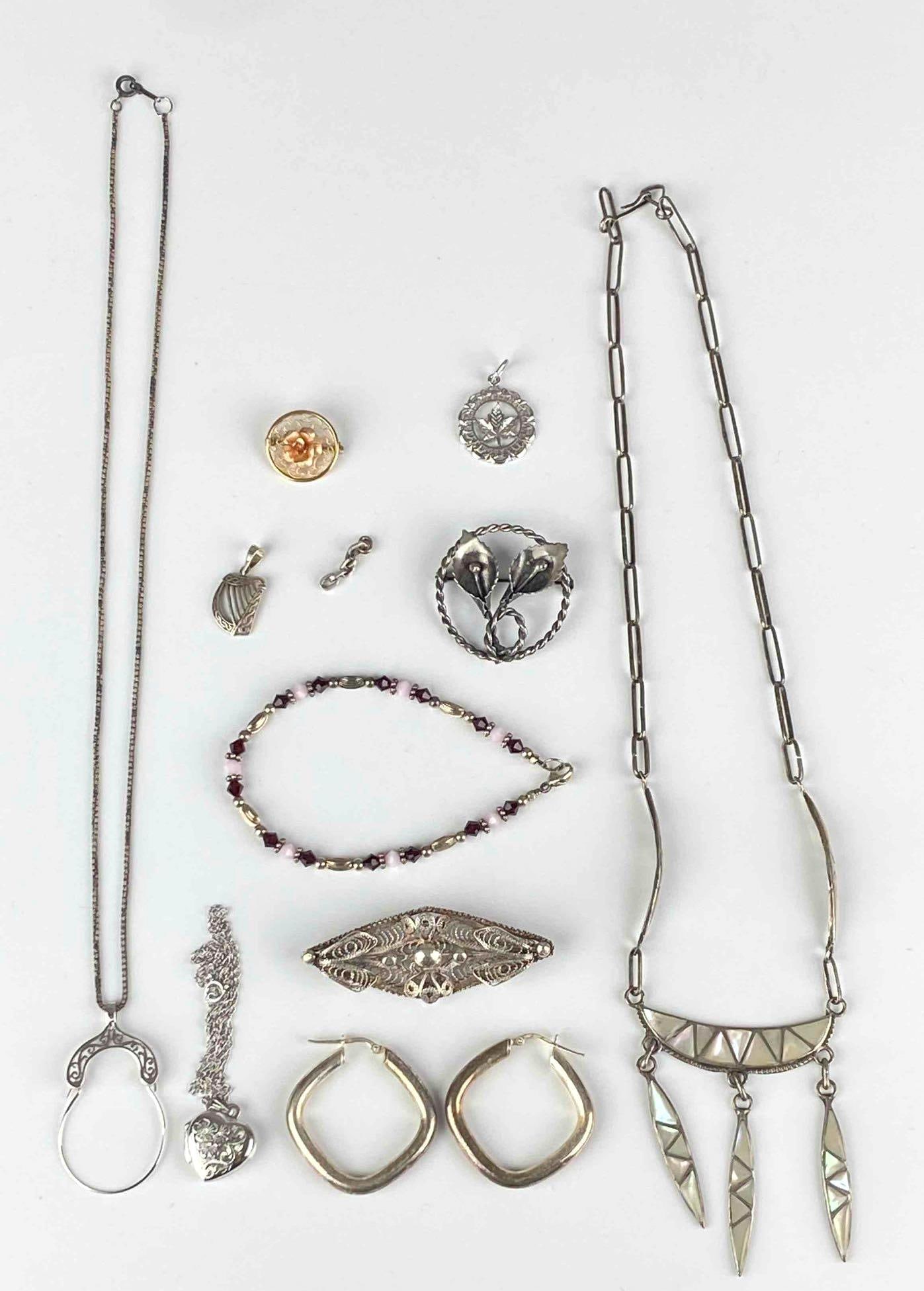 Group of Sterling Silver Jewelry: Includes necklaces, earrings, pendant and more, largest measures 18? in length