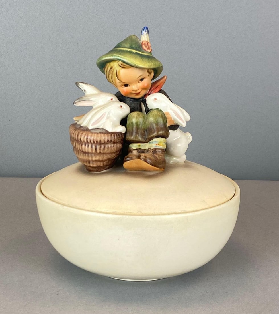 Vintage Goebel Hummel Playmates Porcelain Figural Trinket Box: Marked on base, some crazing throughout, measures 6 3/4? H x 5 3/4? W x 4 3/4? D