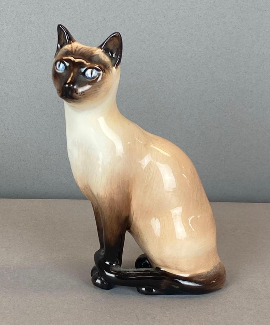 Vintage Royal Dolton Porcelain Siamese Cat Figurine: Vintage Royal Dolton Porcelain Siamese Cat Figurine Marked on base, measures 5 1/2? H x 3 1/2? W x 2? D