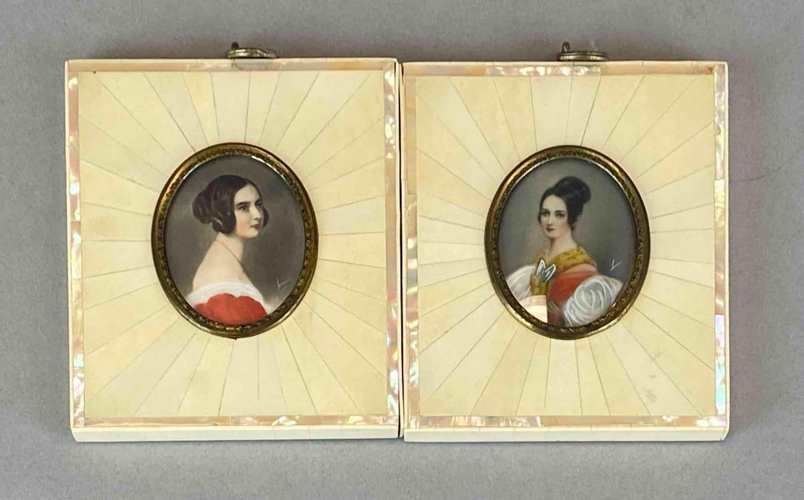 Group of 2 Antique Signed Miniature Women Portraits Oil Paintings with Bone Frames: Signed on bottom right of each portrait, Features Bone frames with mother of Pearl inlay, each frame measures 4 1/2? H x 3 1/2? W