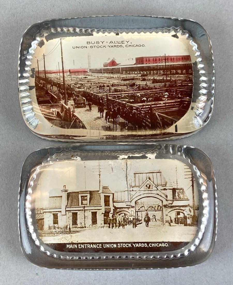 Group of 2 Antique Chicago Illinois Union Stock Yards Souvenir Photograph Glass Paperweights: Depicts bush alley and main entrance, largest measures 2 1/2? H x 4? W x 3/4? D