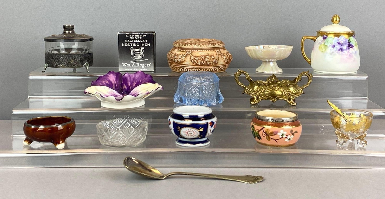Group of Salts and More: Includes sugar, spoons and lidded salts, some sterling silver, largest measures 2? H x 3? W x 3? D