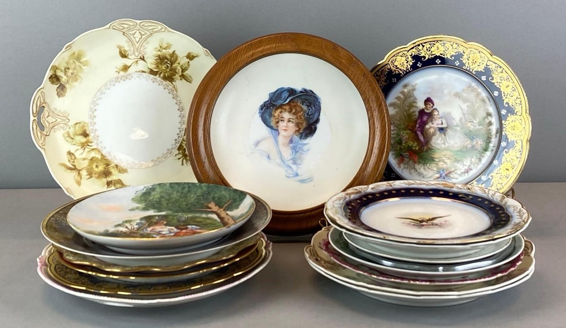 Group of Assorter Porcelain Decorative Plates: Largest measures 10 1/2? H x 12? W
