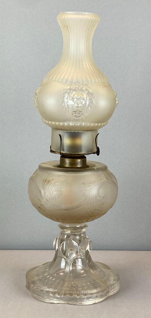 Antique Frosted Glass Oil Lamp: Features lions on chimney, measures 15 1/2? H x 6? W