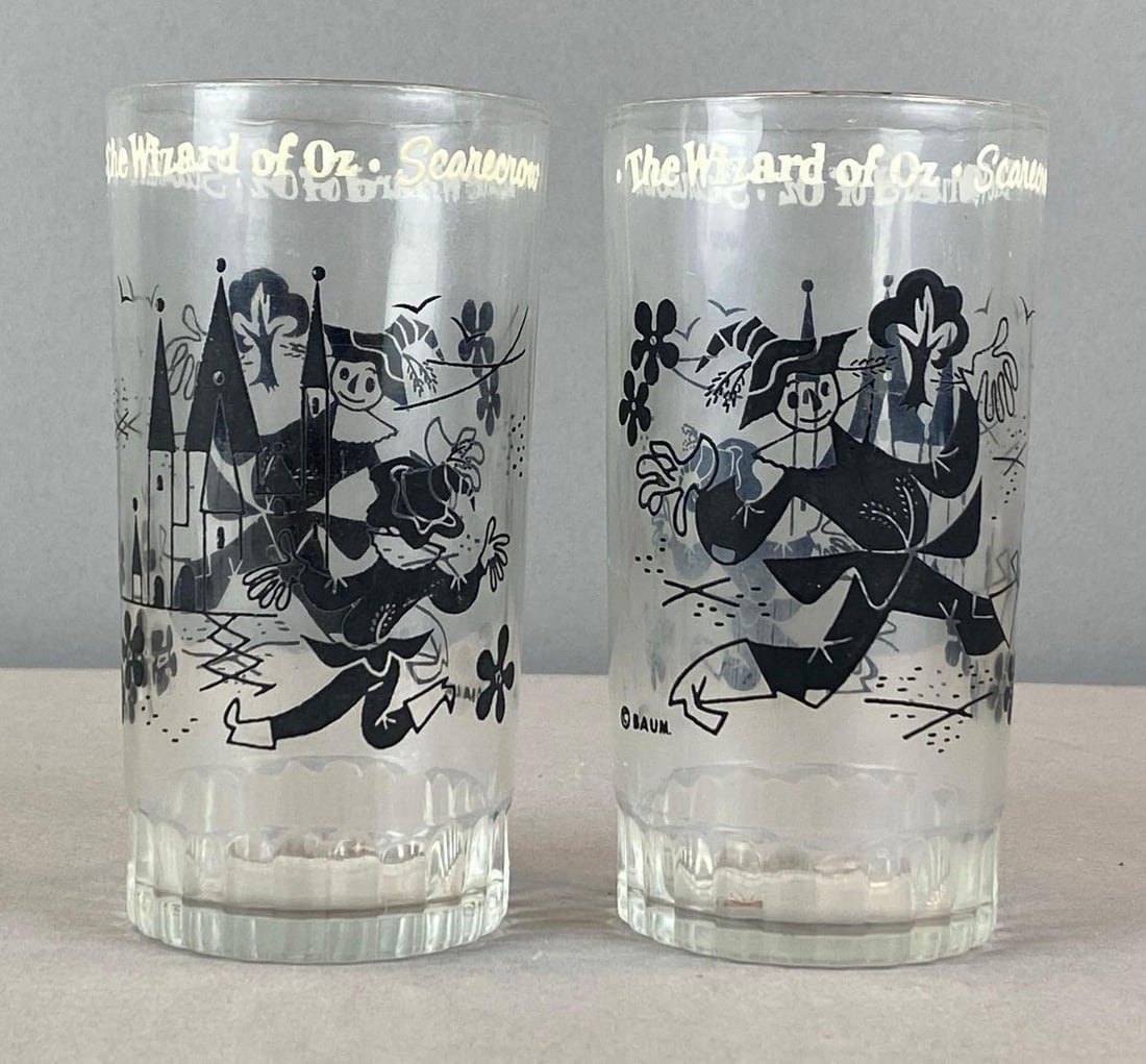 Group of 2 Baum The Wizard of Oz Scarecrow Glass Tumblers: Each measures 5? H x 2 1/2? W