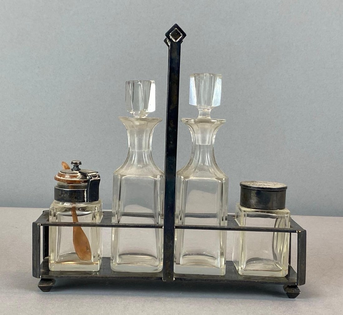 Antique Cruet Set with Silverplated Caddy: Antique Cruet Set with Silverplated Caddy Measures 7 1/4? H x 7 1/4? W x 2 1/4? D