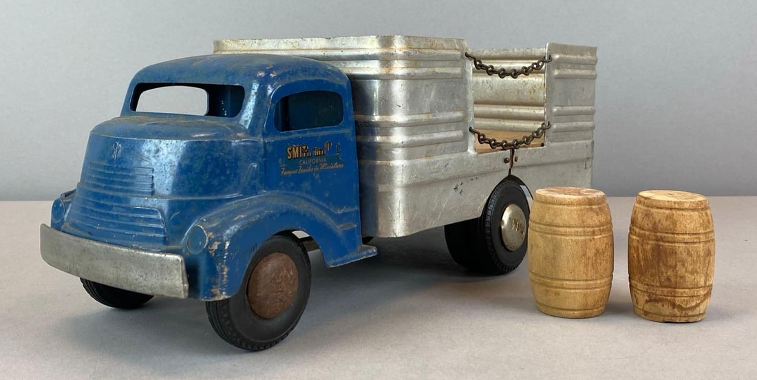 Vintage Smith-Miller Smitty Toys Blue Pressed Steel Delivery Truck: Includes 2 wood barrels, Some rust and wear, measures 6? H x 6? W x 15? D