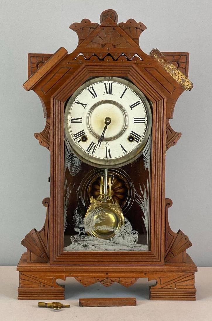 Antique Wood Gingerbread Mantel Clock: Includes key, In working condition, one wood decoration detached, measures 19? H x 12? w x 4? D