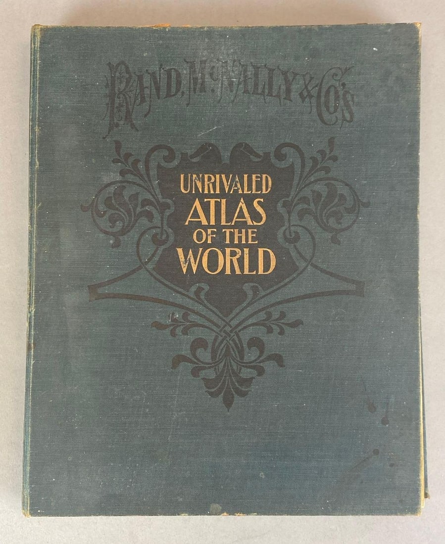 1912 Unrivaled Atlas of the World Hardcover Book: Compiler and publisher - Rand McNally and Co., features colored maps of every country during 1912, alongside various ephemera and plants kept within the pages, measures 14 1/2? H x 11 1/2? W
