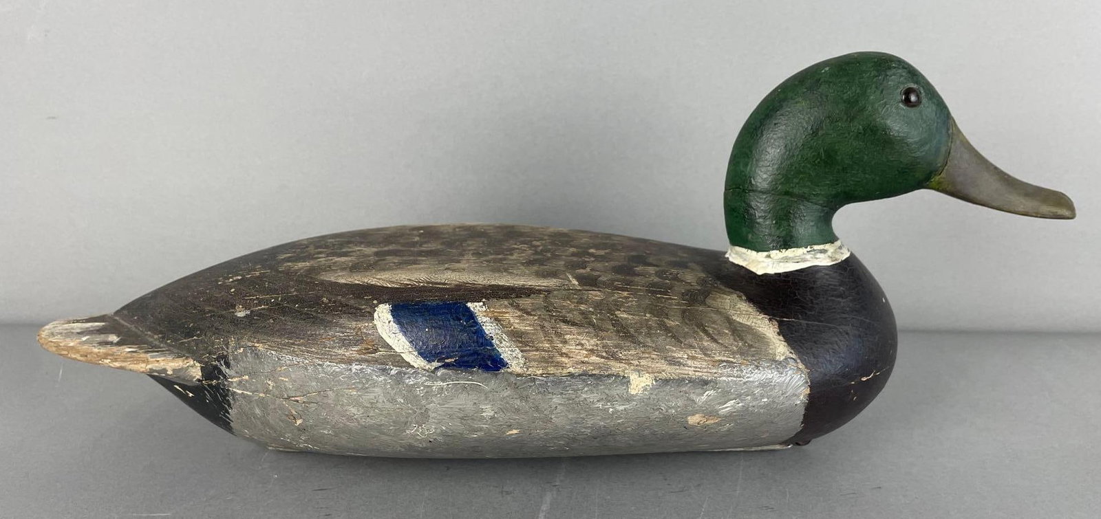 Antique Robert Elliston Mallard Drake Duck Decoy: Top of bird original, bottom restored, replaced head, neck crack, hollow, glass eyes, original weight, measures 6 3/4" x 17" x 6"