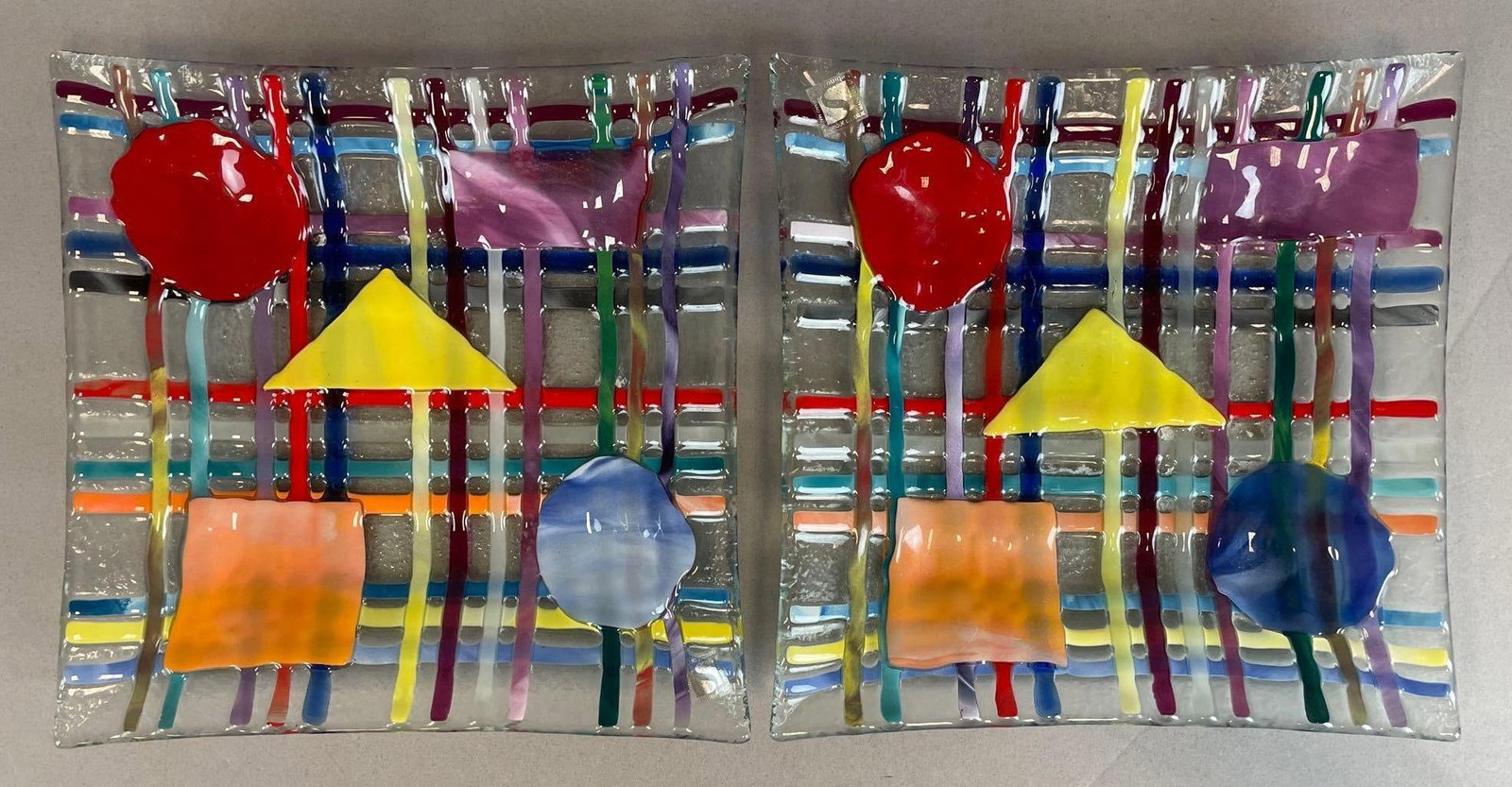 Group of 2 Abstract Art Glass Plates: Each measure 1 1/4" x 8 1/2" x 8 1/2"