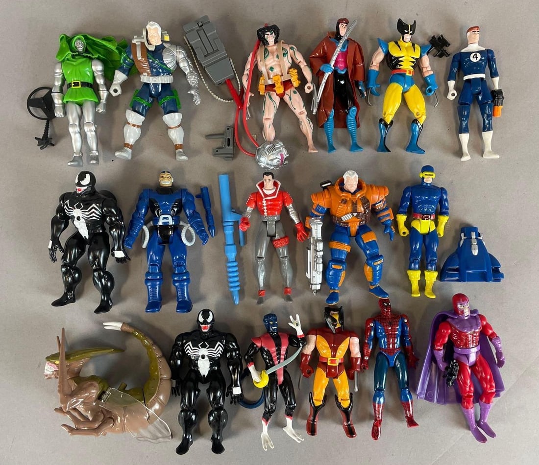 Group of 1990s Toy Biz Marvel Action Figures: Includes venom, Spider-Man, Wolverine, accessories