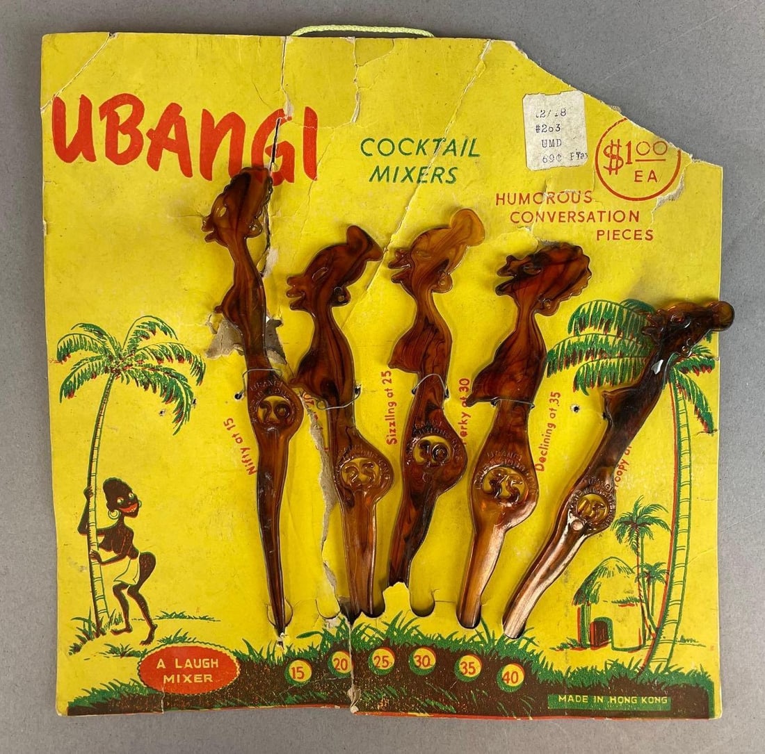 Group of Vintage Ubangi Figural Cocktail Mixers: Swizzle sticks, Original packaging measures 8 1/4" x 8 1/4"