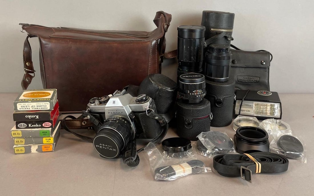 Vintage Honeywell Pentax Spotmatic 35mm Film Camera Bundle: SP II, includes lenses, asahi super lite, cases large leather case measures 7 1/2" x 11" x 6 1/2"
