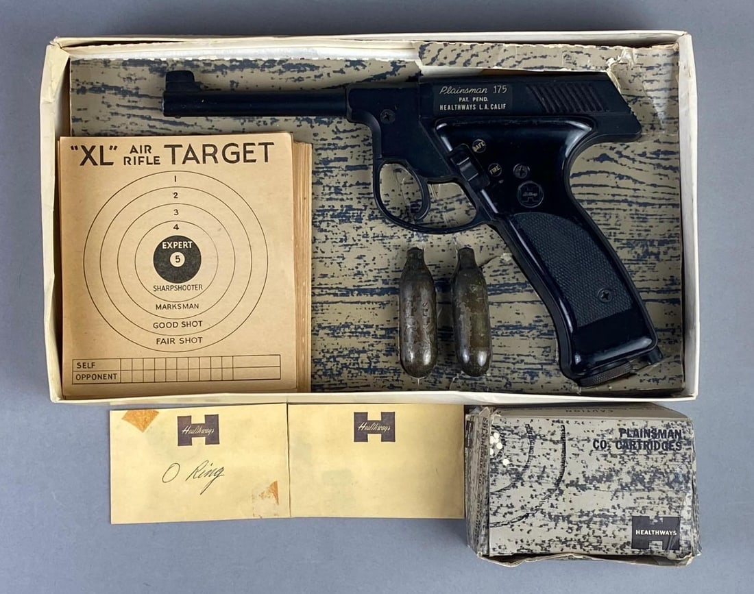 1964 Healthways Plainsman CO2 .175 Cal BB Pistol: Like new in original box with extra CO2 Cartridges. Untested. Box measures L 12 x W 7 inches.