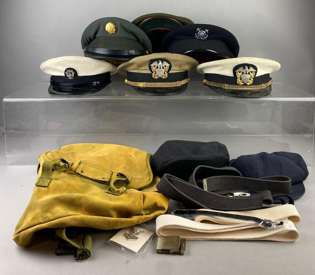 Group of Assorted US Military Caps and More: Includes USN Belts, Caps, and more. Stand is not included. Cap size is 7 1/8