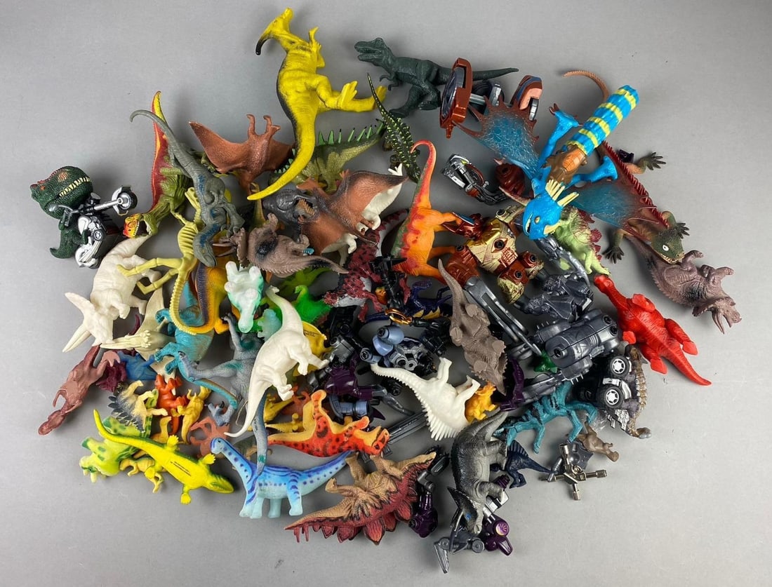 Group of Assorted Dinosaurs Toys and More: Largest measures 8? in length.