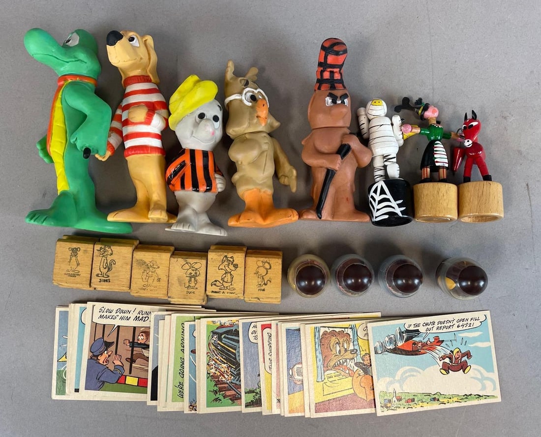 Group of Vintage Toy Figures and More: Includes Walt Kelly pogo, goofy series postcards, Hanna barbera stamps