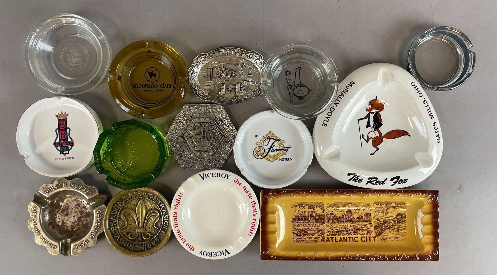 Group of Advertising Ashtrays and More: Includes NYC souvenir tray, viceroy cigarettes, hotels, red fox measures 7 1/4" x 7 1/4"