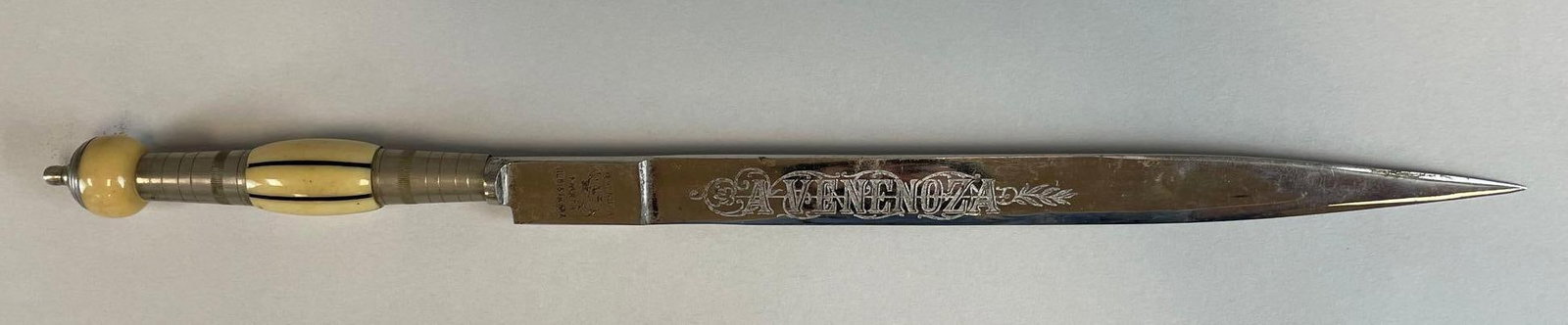 Vintage A. Venenoza Brazilian Gaucho Dagger: Etched dragon motif, 5000, measures 14"