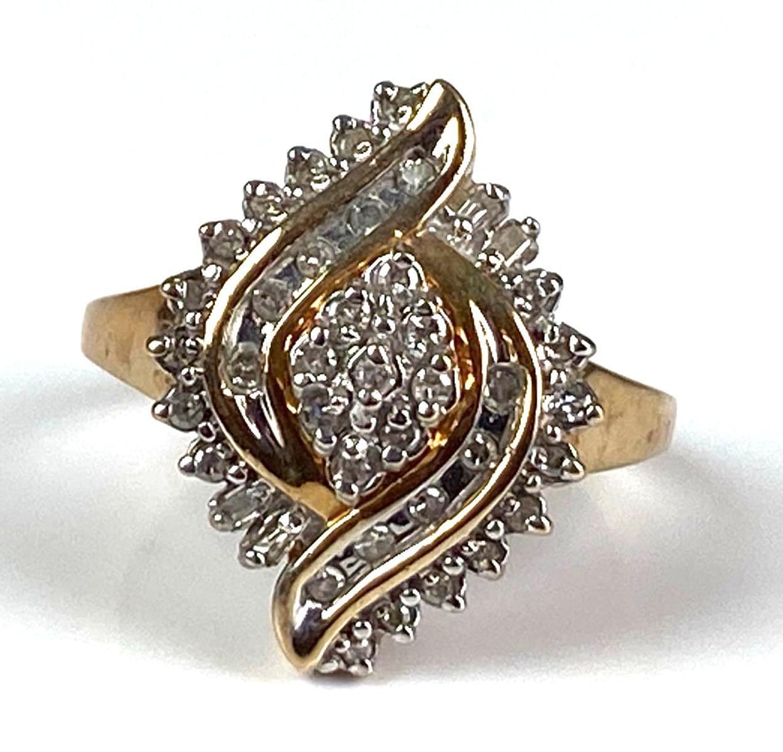 Signed 10K Yellow Gold Diamond Cluster Ring: Total weight of 3.8 grams, size 7 1/2