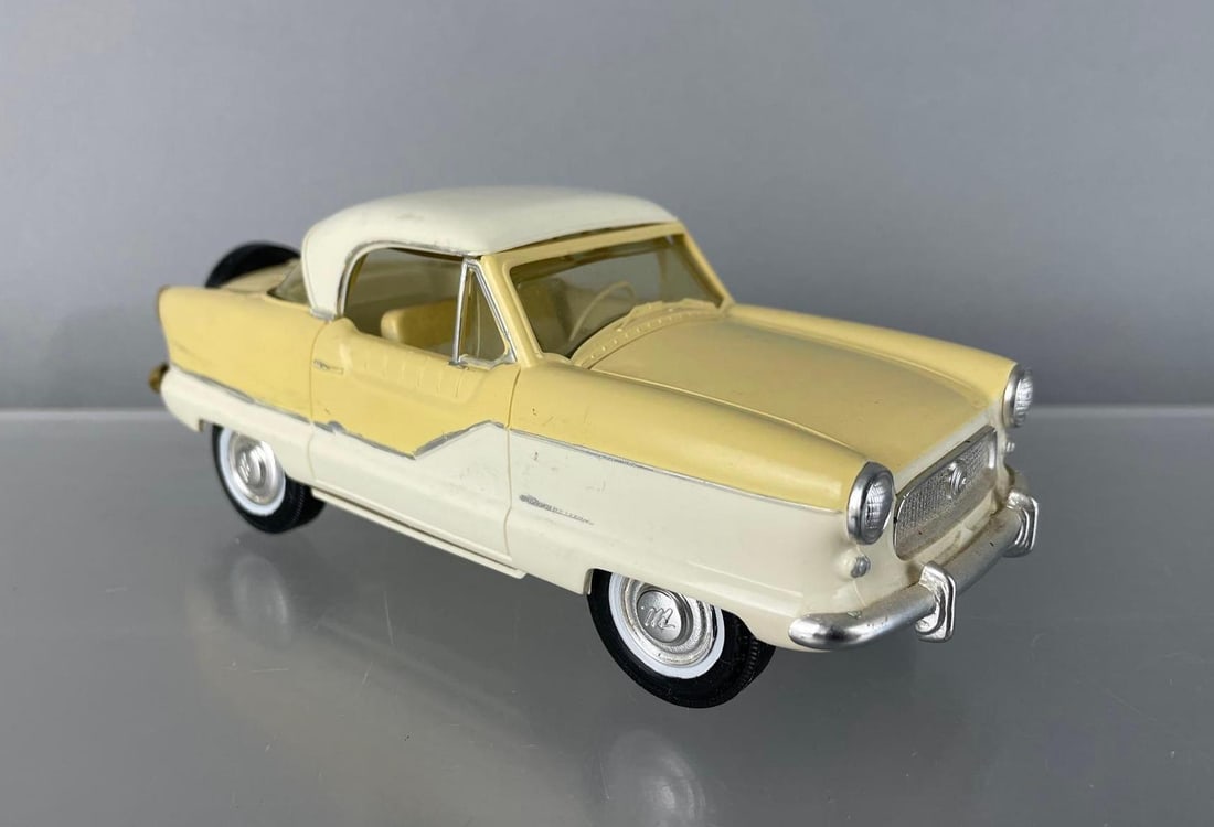 Hubley 1960 AMC Metropolitan Two-Tone Dealership Promo Car: White yellow, working front friction, rear wheels don't roll, scratches and scuffs