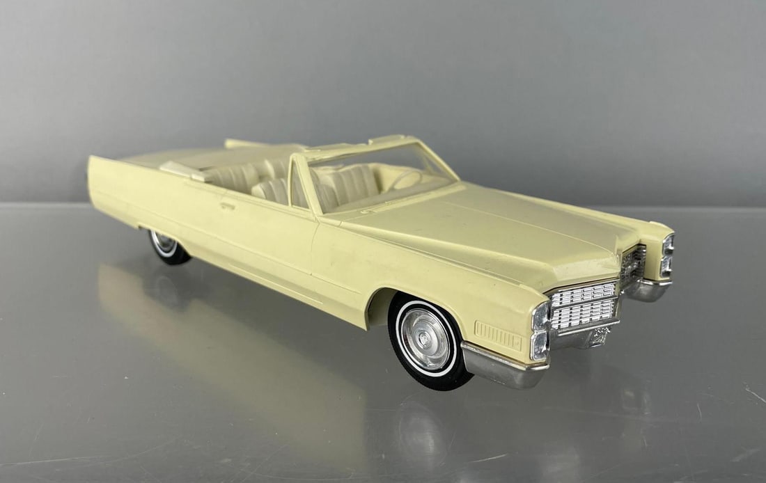 1966 Cadillac DeVille Convertible Dealership Promo Car: Pale yellow, cracked driver vent, coaster