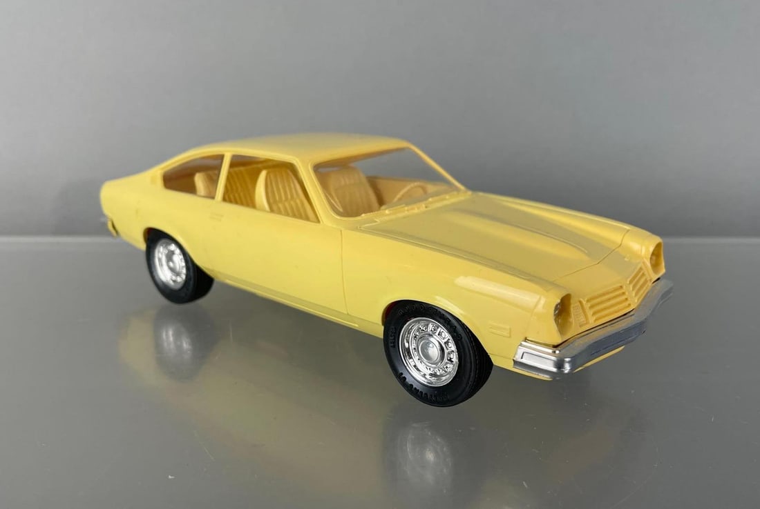 1975 Chevy Vega Yellow Dealership Promo Car: Matching interior, coaster