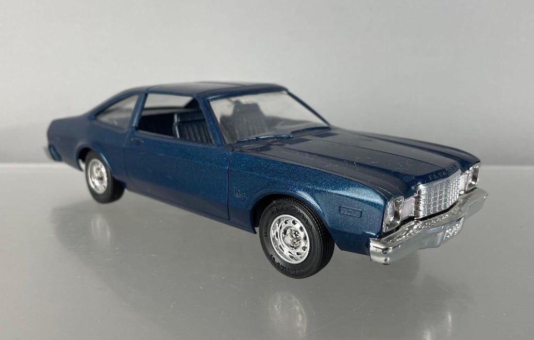 1978 Plymouth Volare Metallic Blue Dealership Promo Car: Scuffs on hood, paint missing on driver side rear quarter panel