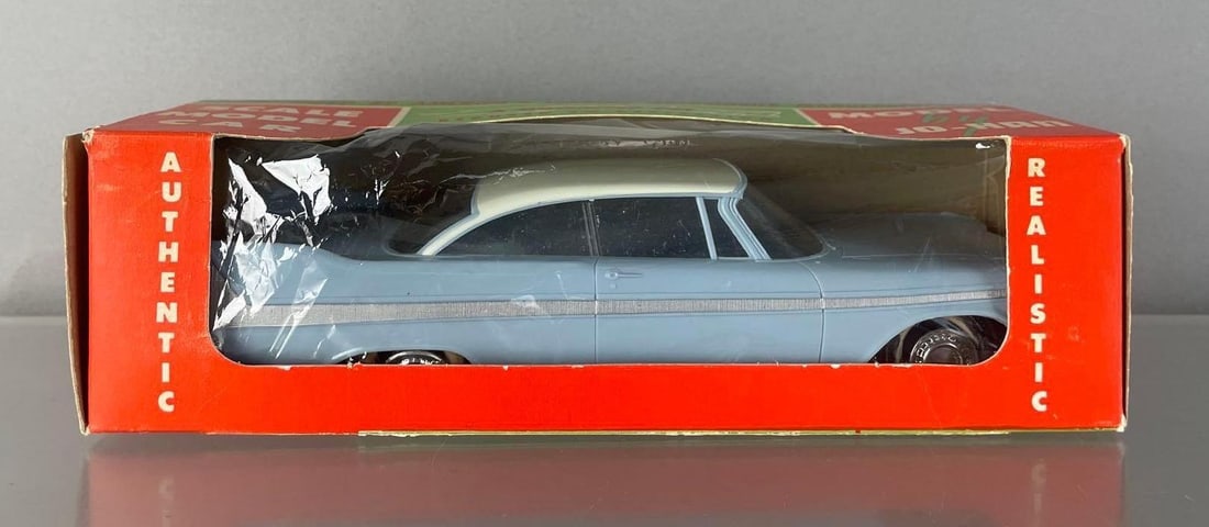1958 Plymouth Belvedere Hardtop Dealership Promo Car: White and blue friction, bad wheels, original box