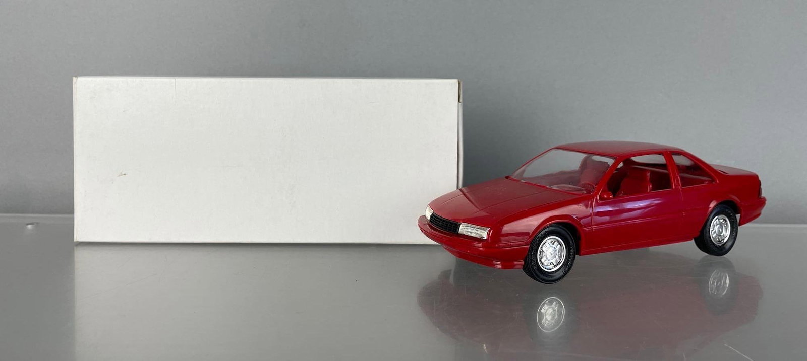 1988 Chevy Beretta GT Bright Red Dealership Promo Car: Original box and tissue, red interior