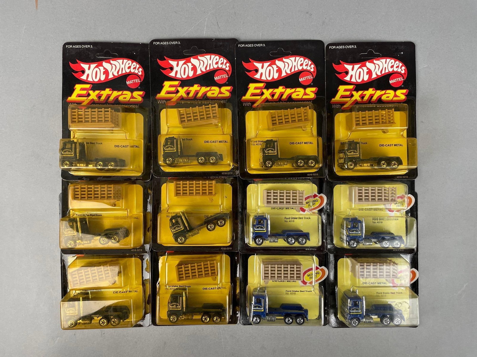 Group of Mattel Hot Wheels Die-Cast Ford Stake Bed Truxks: Sunset trucking
