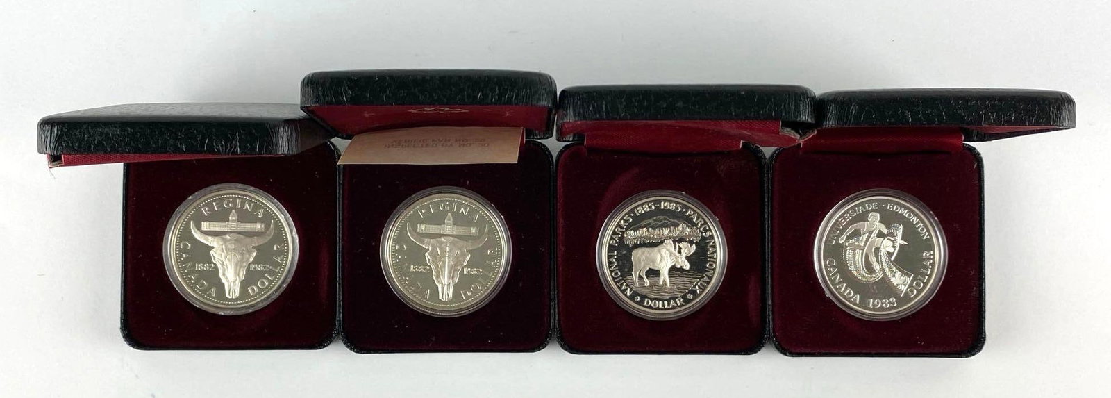 Group of 4 Assorted Royal Canadian Mint Commemorative 50% Silver Proof Dollars (1 of 2)