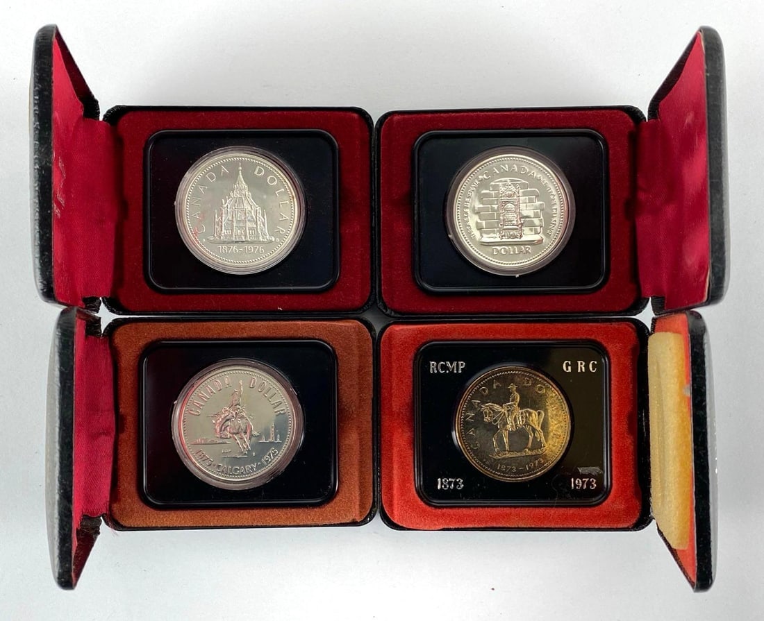 Group of 4 Assorted Royal Canadian Mint Commemorative 50% Silver Proof Dollars: Includes years 1976, 1975, 1973 and more.