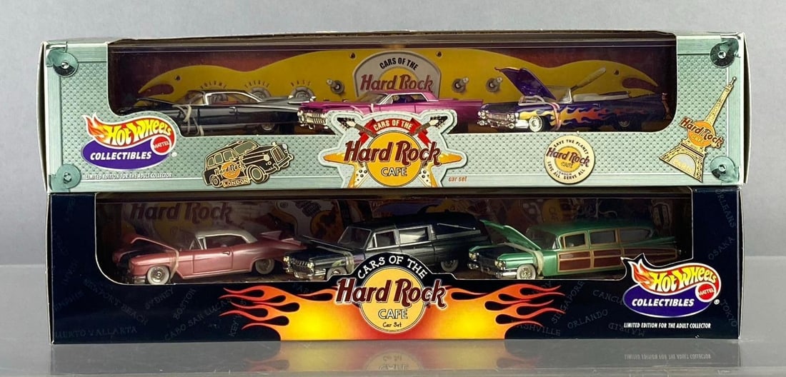 Group of 2 Mattel HotWheels Cars of the Hard Rock Cafe 1:64 Scale Die Cast Vehicle Sets: Like new in original packaging. One measures H 2 1/2 x W 4 x L 12 inches.