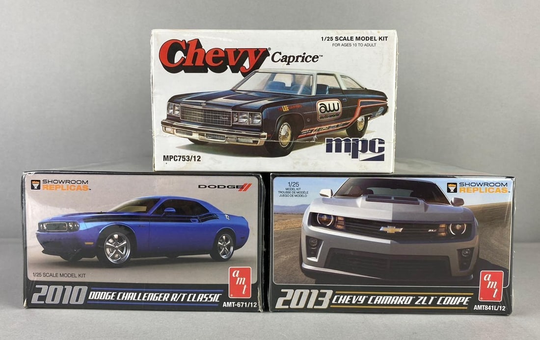 Group of 3 AMT Monogram 1:25 Scale Model Car Kits: Includes 2010 Dodge Challenger, 2013 Chevy Camaro, and more. Like new in sealed original packaging.