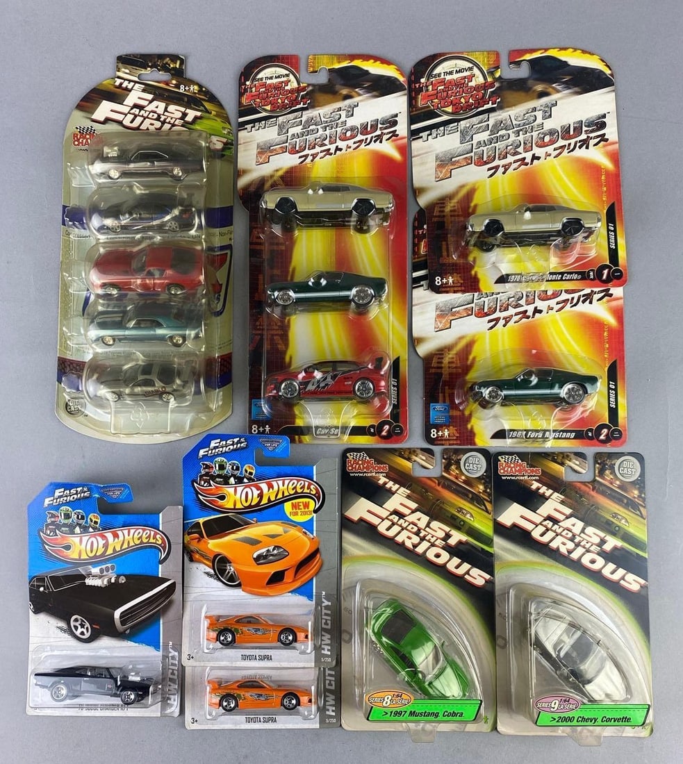Group of Assorted Mattel HotWheels The Fast and The Furious 1:64 Scale Die Cast Vehicles: Like new in original packaging. Includes Toyota Supra, 1970 Dodge Charger, and more.