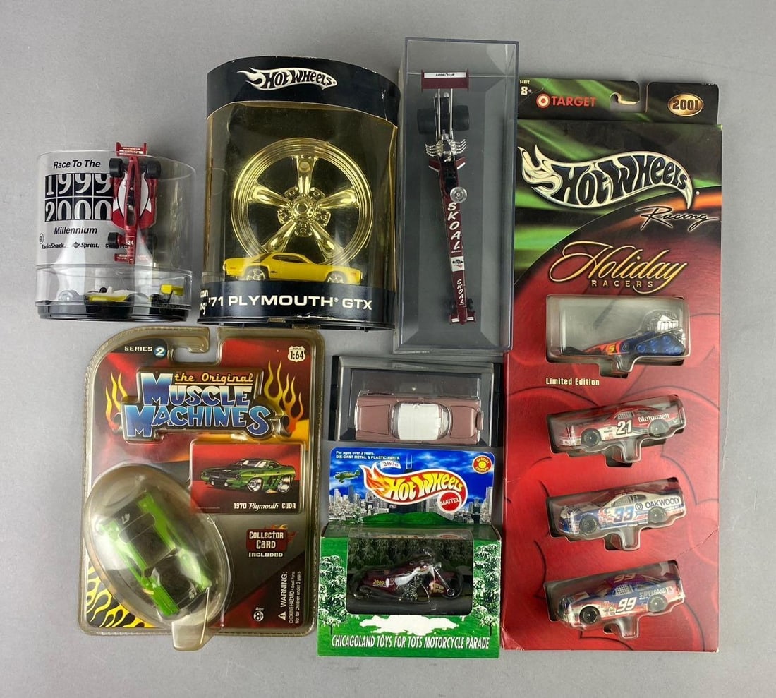 Group of Assorted Mattel HotWheels 1:64 Scale Die Cast Vehicles and More: Like new in original packaging.