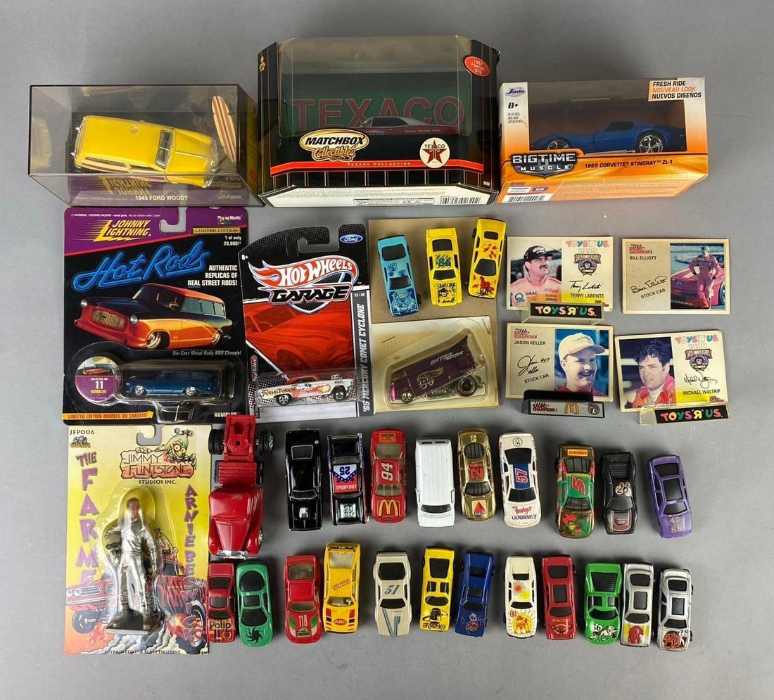 Group of Assorted 1:64 Scale Die Cast Vehicles and More: Includes display stands, cars, and more.