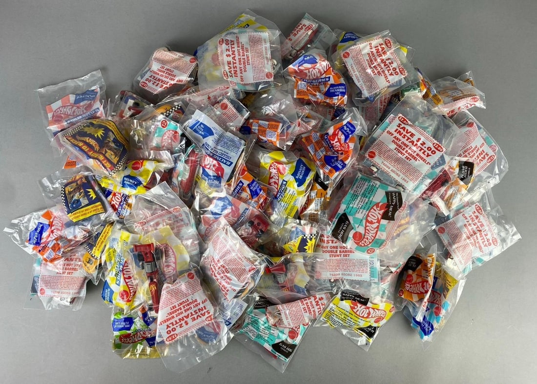 Group of Assorted McDonald?s Happy Meal Mattel Hot Wheels 1:64 Scale Die Cast Vehicles: Like new in original packaging.