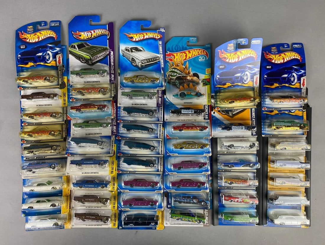 Group of Assorted Mattel HotWheels Lincoln Continental 1:64 Scale Die Cast Vehicles and More: Like new in original packaging.