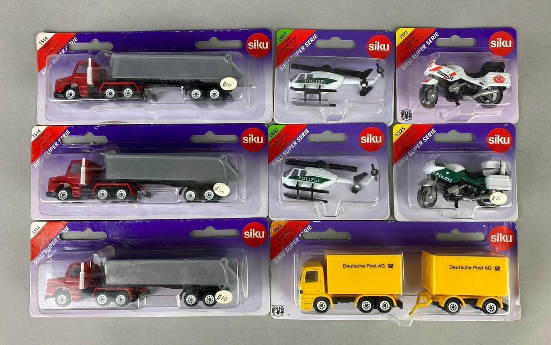 Group of Assorted German Siku 1:64 Scale Die Cast Vehicles: Like new in original packaging.