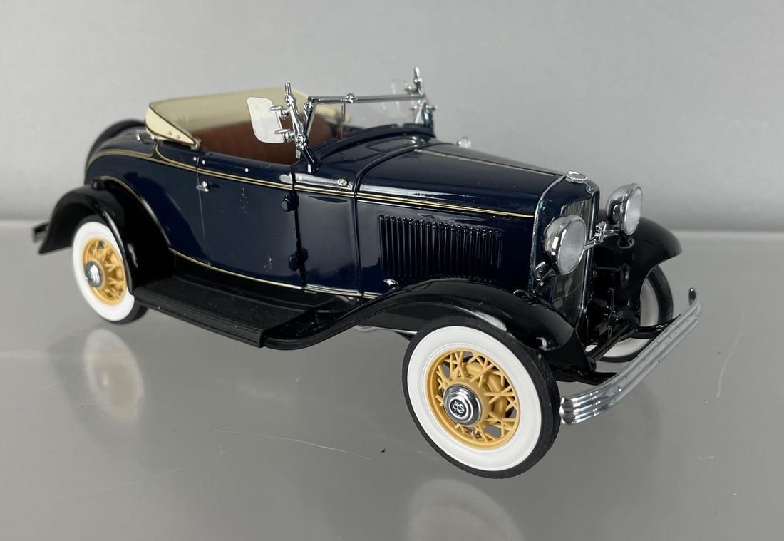 Danbury Mint 1932 Ford Deluxe Roadster V-8 Die-Cast Car: Dark blue with tan top, 1/24 scale convertible, original packaging